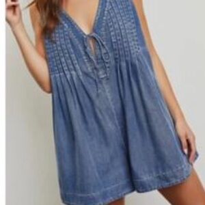 Great denim romper never worn !!!